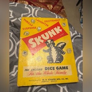 1953 vintage Skunk Dice Game - Yellow